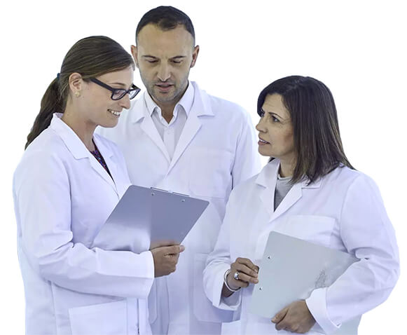 three people looking at clipboard