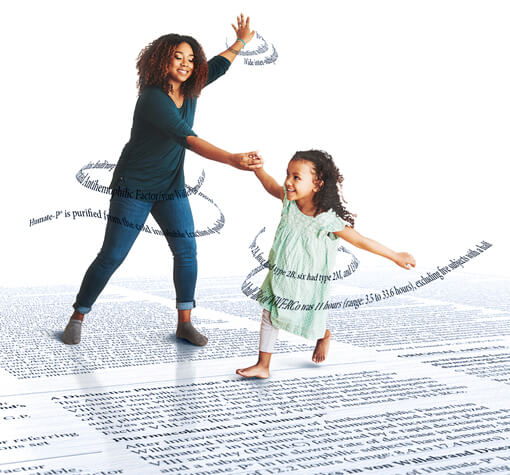 woman holding little girl