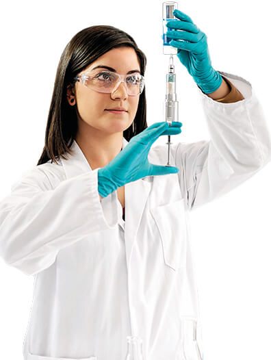 woman holding syringe